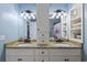 Elegant bathroom featuring a double vanity with granite counters, ample storage, and great lighting at 64 Highway 521, Andrews, SC 29510