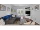 Comfortable living area with built-in shelving and entertainment center at 64 Highway 521, Andrews, SC 29510