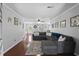 Spacious living room with great natural light and hardwood flooring at 64 Highway 521, Andrews, SC 29510