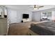 Large main bedroom showcasing ample space, neutral tones, and a ceiling fan for added comfort at 64 Highway 521, Andrews, SC 29510