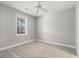 Cozy bedroom with neutral carpet and a bright window offering natural light at 682 Riverwalk Dr. # 102, Myrtle Beach, SC 29579