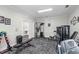 Spacious fitness center with various exercise machines, including weights, and motivational signage on the wall at 682 Riverwalk Dr. # 102, Myrtle Beach, SC 29579
