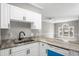 Kitchen featuring stainless sink and updated countertops at 682 Riverwalk Dr. # 102, Myrtle Beach, SC 29579