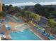 An aerial view of the lazy river and pools with beach in the distance at 7000 N Ocean Blvd. # 427, Myrtle Beach, SC 29572