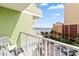 Enjoy ocean views from this building balcony with a view of the beach and adjacent parking area at 7000 N Ocean Blvd. # 427, Myrtle Beach, SC 29572