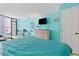 Bright bedroom featuring stylish decor, comfortable queen bed, and access to the balcony at 7000 N Ocean Blvd. # 427, Myrtle Beach, SC 29572