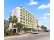 Modern condo building featuring a white exterior and multiple balconies in a vibrant beachside community at 7000 N Ocean Blvd. # 427, Myrtle Beach, SC 29572