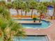 Scenic lazy river with palm trees and tropical landscaping at 7000 N Ocean Blvd. # 427, Myrtle Beach, SC 29572