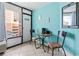 Bright sitting area with coffee maker and table with access to the balcony at 7000 N Ocean Blvd. # 427, Myrtle Beach, SC 29572