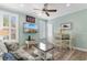Inviting living room with a beachy vibe, featuring cozy seating and coastal decor accents at 703 S Waccamaw Dr., Garden City Beach, SC 29576