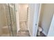 Bathroom featuring a glass shower, a toilet, and a walk-in closet at 7040 Belancino Blvd., Myrtle Beach, SC 29572