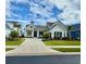Inviting single-Gathering home with manicured lawn and a concrete driveway with nice landscaping at 7040 Belancino Blvd., Myrtle Beach, SC 29572