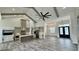 Open-concept kitchen with stainless steel appliances, an island, and a view of the living area at 7040 Belancino Blvd., Myrtle Beach, SC 29572