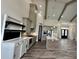 Modern kitchen featuring gray cabinetry, an island, and stainless steel appliances at 7040 Belancino Blvd., Myrtle Beach, SC 29572