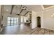 Spacious living room featuring high ceilings, wood floors, and a fireplace at 7040 Belancino Blvd., Myrtle Beach, SC 29572