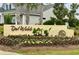 Community entrance sign with colorful flowers and lush landscaping at 7040 Belancino Blvd., Myrtle Beach, SC 29572