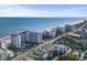 Coastal view featuring beachfront resorts, a sandy shoreline, and the vast ocean beyond at 7100 N Ocean Blvd. # 204, Myrtle Beach, SC 29572