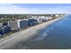 Aerial view of the coastline showing hotels, beach and the ocean at 7100 N Ocean Blvd. # 204, Myrtle Beach, SC 29572