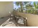 Hotel balcony with seating and beach views at 7100 N Ocean Blvd. # 204, Myrtle Beach, SC 29572