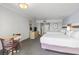 Comfortable bedroom offering two beds and a cozy seating area for relaxation at 7100 N Ocean Blvd. # 204, Myrtle Beach, SC 29572