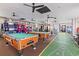 Spacious game room with pool tables, shuffleboard and arcade games for indoor entertainment at 7100 N Ocean Blvd. # 204, Myrtle Beach, SC 29572
