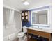 Bathroom featuring a shower-tub combo and ample storage at 7100 N Ocean Blvd. N # 321, Myrtle Beach, SC 29572