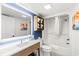 Well-lit bathroom with modern fixtures, a vanity, and a shower-tub combination at 7100 N Ocean Blvd. N # 321, Myrtle Beach, SC 29572