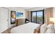 Comfortable bedroom with a balcony overlooking a stunning ocean view at 7100 N Ocean Blvd. N # 321, Myrtle Beach, SC 29572