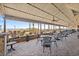 Elegant outdoor dining area with comfortable seating, providing scenic views of the beach at 7100 N Ocean Blvd. N # 321, Myrtle Beach, SC 29572