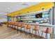 Modern bar with sleek counter, stylish stools, pendant lighting and televisions for an upscale experience at 7200 N Ocean Blvd. # 360, Myrtle Beach, SC 29572