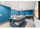 Spacious dining area with a buffet, blue walls, recessed lighting, and tile flooring at 7200 N Ocean Blvd. # 360, Myrtle Beach, SC 29572