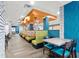 Stylish dining area showcasing booth seating with wood tables and comfortable cushioned chairs at 7200 N Ocean Blvd. # 360, Myrtle Beach, SC 29572