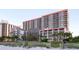 Oceanfront resort featuring balconies and partial ocean views with a dune in the foreground at 7200 N Ocean Blvd. # 360, Myrtle Beach, SC 29572