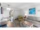 Modern living space with dining area, sofa, and stylish decor with an adjacent doorway at 7200 N Ocean Blvd. # 360, Myrtle Beach, SC 29572