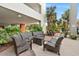 Relaxing outdoor patio featuring comfortable seating, lush landscaping, and shade at 7200 N Ocean Blvd. # 360, Myrtle Beach, SC 29572