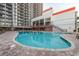 Large outdoor pool with plenty of chairs, ocean views, and a large deck area to enjoy at 7200 N Ocean Blvd. # 360, Myrtle Beach, SC 29572