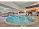 Relaxing indoor pool with poolside seating and easy access with stairs to the shallow end at 7200 N Ocean Blvd. # 360, Myrtle Beach, SC 29572