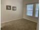 Neutral bedroom with plush carpeting, double window, and blank canvas for personalization at 739 Shell Creek Circle # 739, North Myrtle Beach, SC 29582