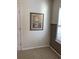 Bedroom featuring neutral colors, trim, and a decorative wall art piece at 739 Shell Creek Circle # 739, North Myrtle Beach, SC 29582
