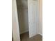 Bedroom closet with a bifold door, top shelf, and carpeted floor at 739 Shell Creek Circle # 739, North Myrtle Beach, SC 29582