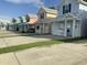 Charming cottages in a row, each painted in a different pastel color at 739 Shell Creek Circle # 739, North Myrtle Beach, SC 29582