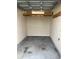 Clean and well-lit one car garage interior ready for use at 739 Shell Creek Circle # 739, North Myrtle Beach, SC 29582