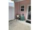A quaint patio features a chair, side table and dolphin statue at 739 Shell Creek Circle # 739, North Myrtle Beach, SC 29582