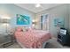 Inviting bedroom showcases a comfortable bed with a unique geometric patterned coral and white duvet set at 750 Howard Ave. # C, Myrtle Beach, SC 29577