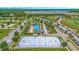 Aerial view showcases an ice rink, parking and surrounding residential areas in a well kept community at 750 Howard Ave. # C, Myrtle Beach, SC 29577