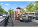 Community playground with slide and climbing features offers a safe and fun recreational space for children at 750 Howard Ave. # C, Myrtle Beach, SC 29577