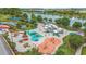 Overhead shot of colorful playground in a community, featuring diverse play structures and ample seating at 750 Howard Ave. # C, Myrtle Beach, SC 29577