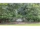Welcoming entrance to True Blue Plantation, offering golf and dining open to the public, surrounded by lush greenery at 750 Pinehurst Ln. # 84A, Pawleys Island, SC 29585