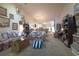 Spacious living room with plush carpeting, comfortable sofas, and an open layout perfect for entertaining at 750 Pinehurst Ln. # 84A, Pawleys Island, SC 29585