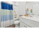 A well-lit bathroom with a shower and bathtub combination and a white vanity sink at 751 Dusty Pine Way, Myrtle Beach, SC 29588
